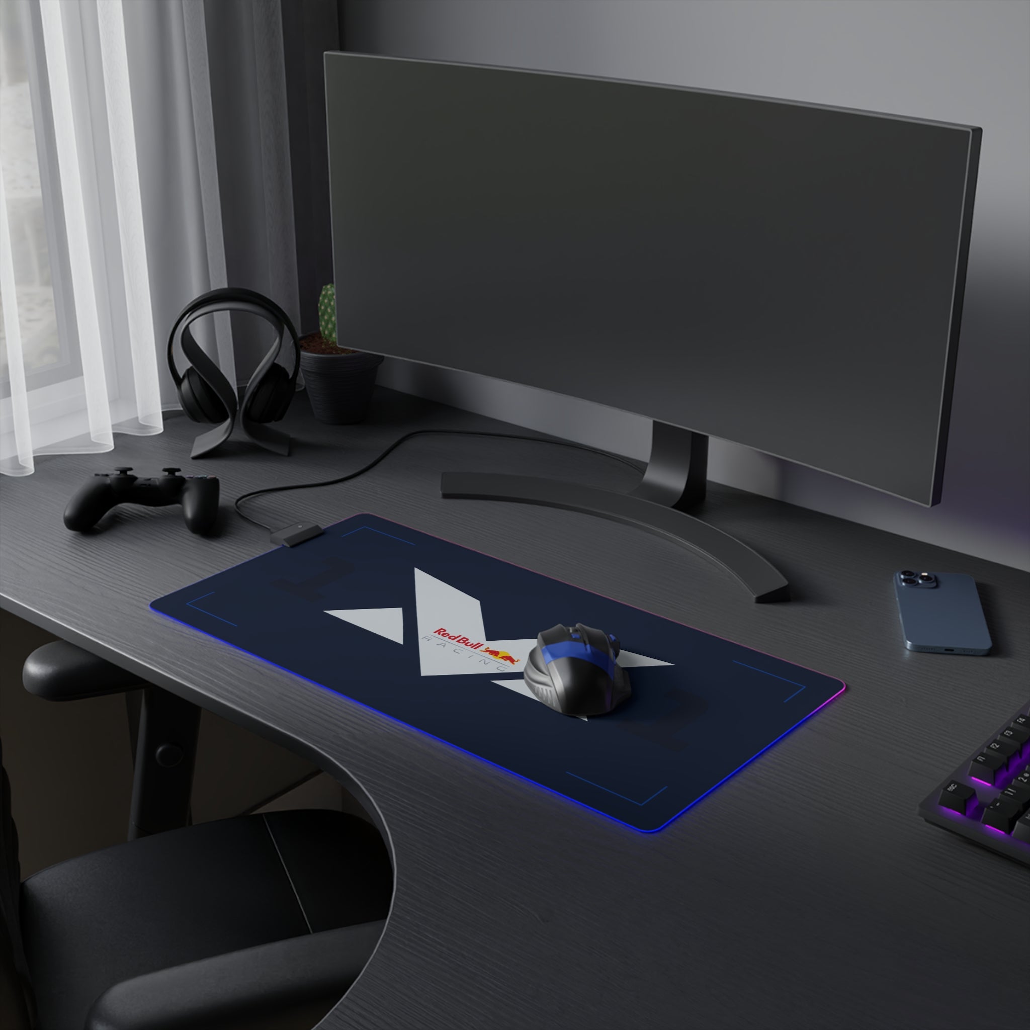 Blue and red racing-themed gaming mouse pad with a sleek surface and bold motorsport design. Inspired by elite Dutch racing.