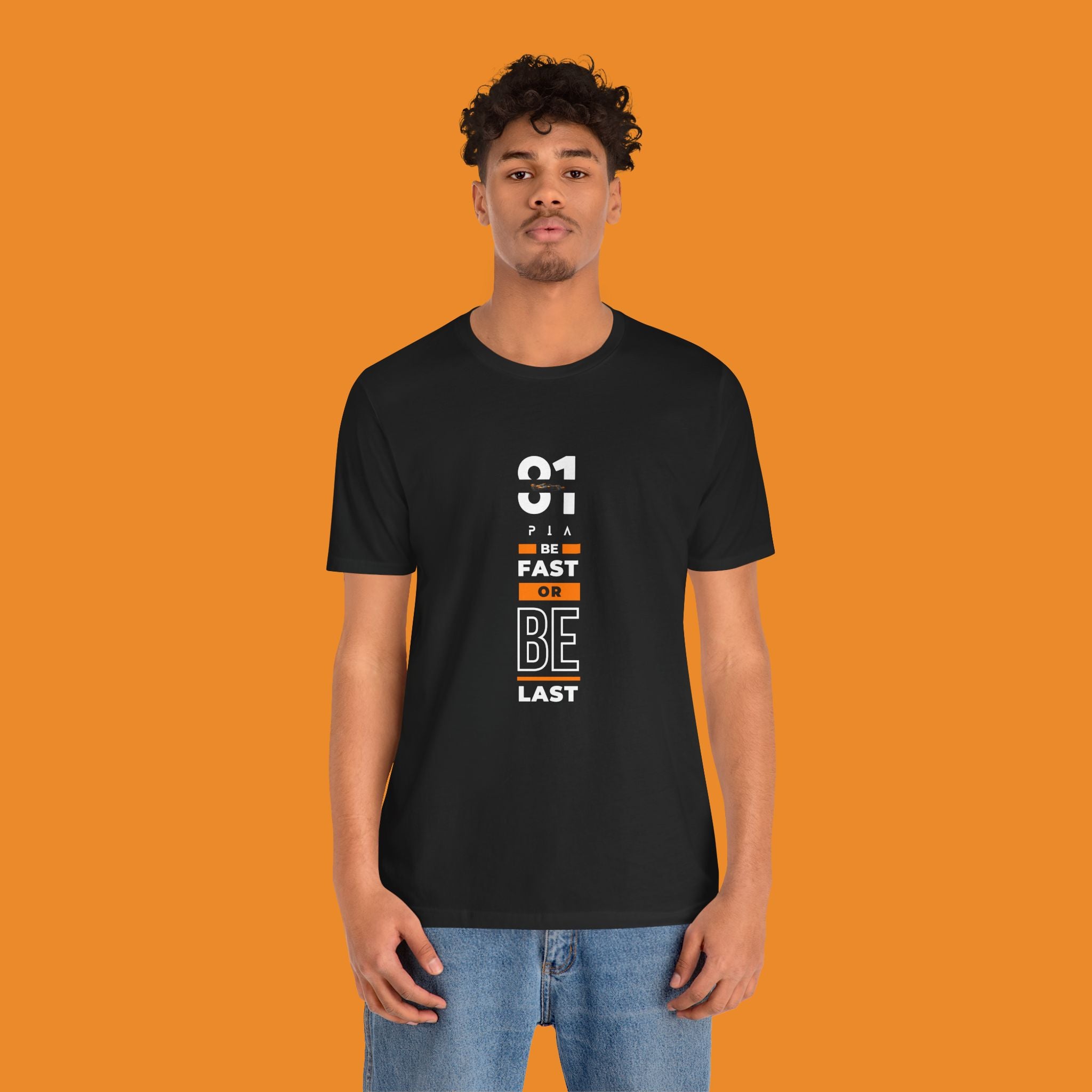 Papaya orange racing-inspired unisex short sleeve tee with a motorsport aesthetic. Perfect for Grand Prix fans and speed enthusiasts.