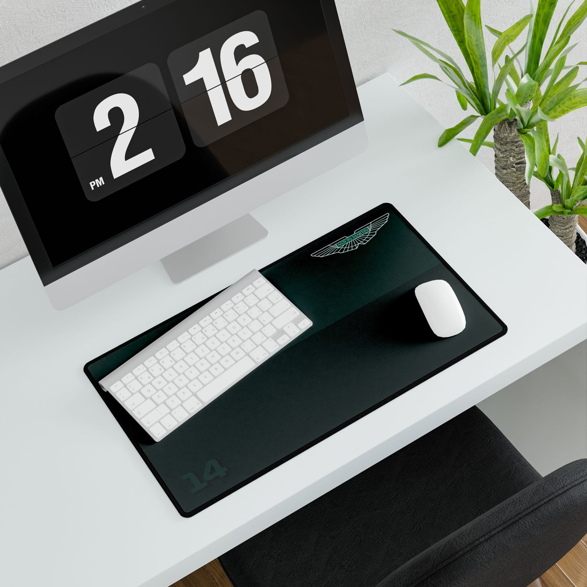 Green racing-inspired desk mat featuring a sleek Grand Prix aesthetic. Ideal for motorsport fans and home office setups.