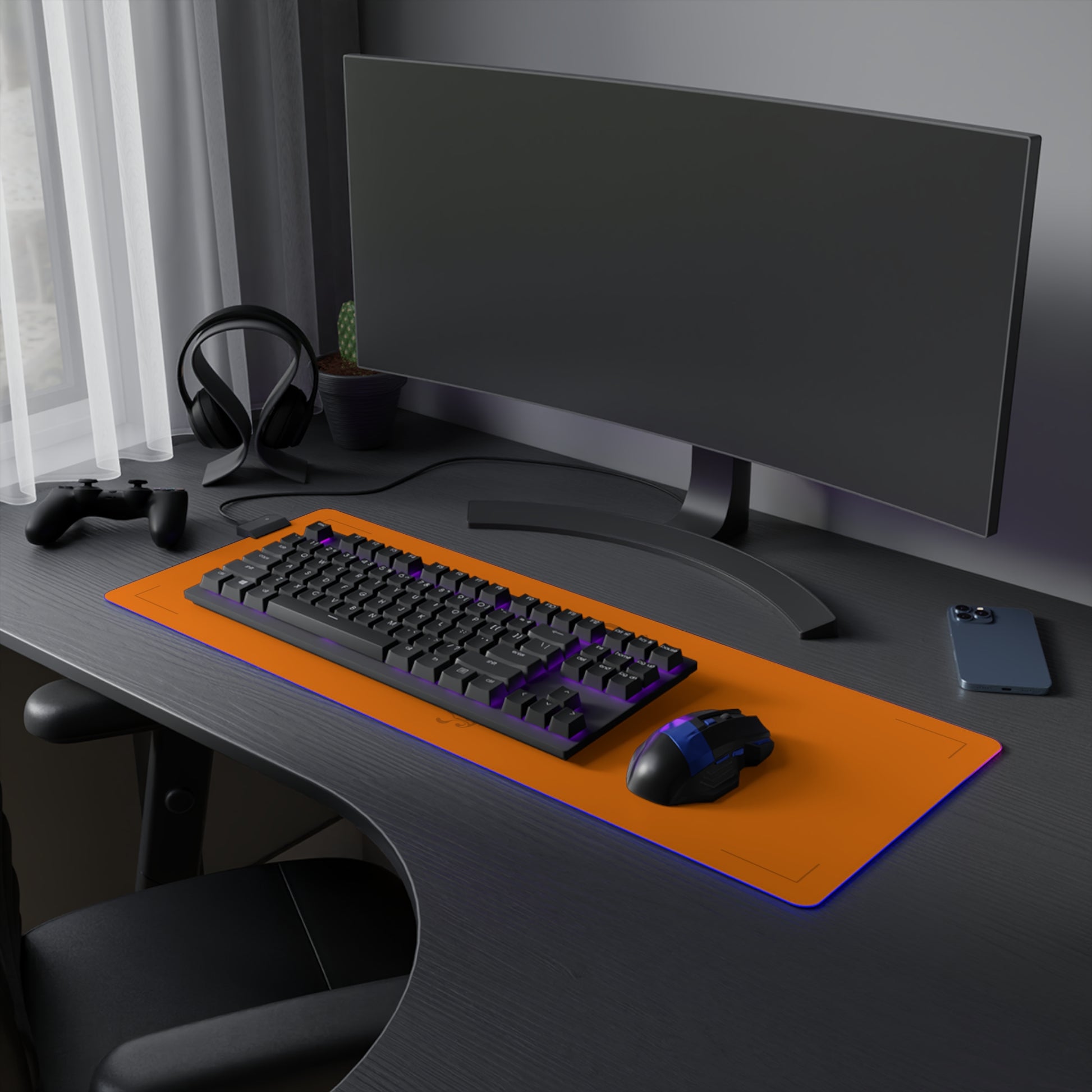 Papaya orange and black racing-inspired mouse pad with a high-performance glide surface. Inspired by young British racing talent.