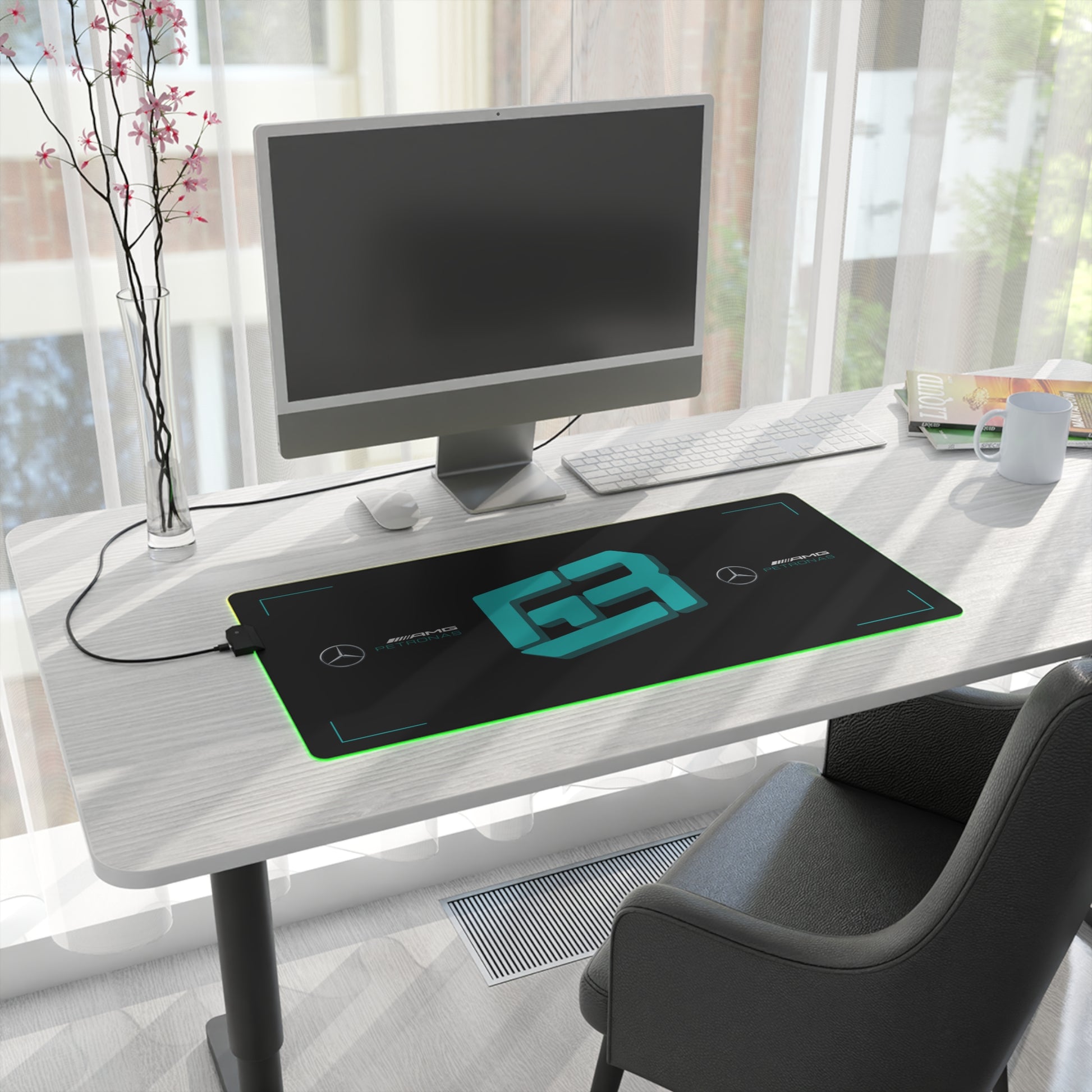Silver and black racing-inspired gaming mouse pad with a high-precision surface and sleek motorsport aesthetic. Inspired by tire management and elite control.