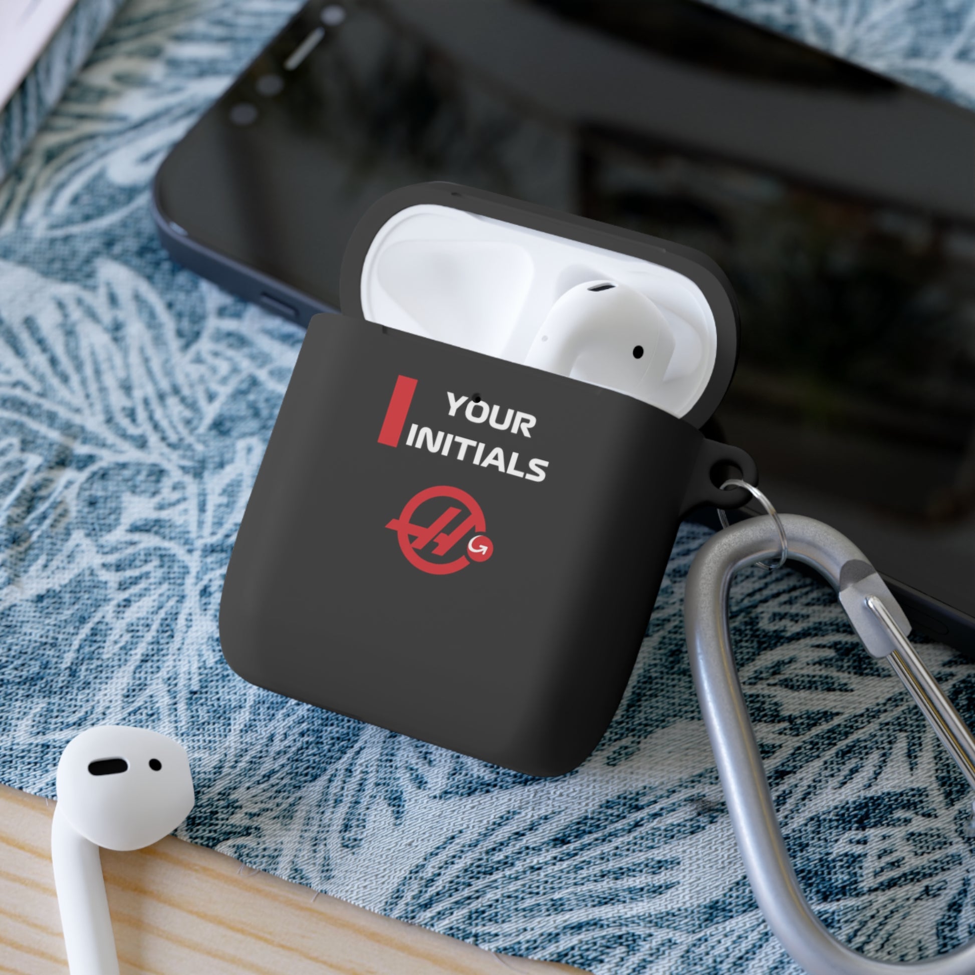 White and red racing-inspired AirPods case with a sleek Grand Prix aesthetic and custom initials option. Ideal for motorsport fans.