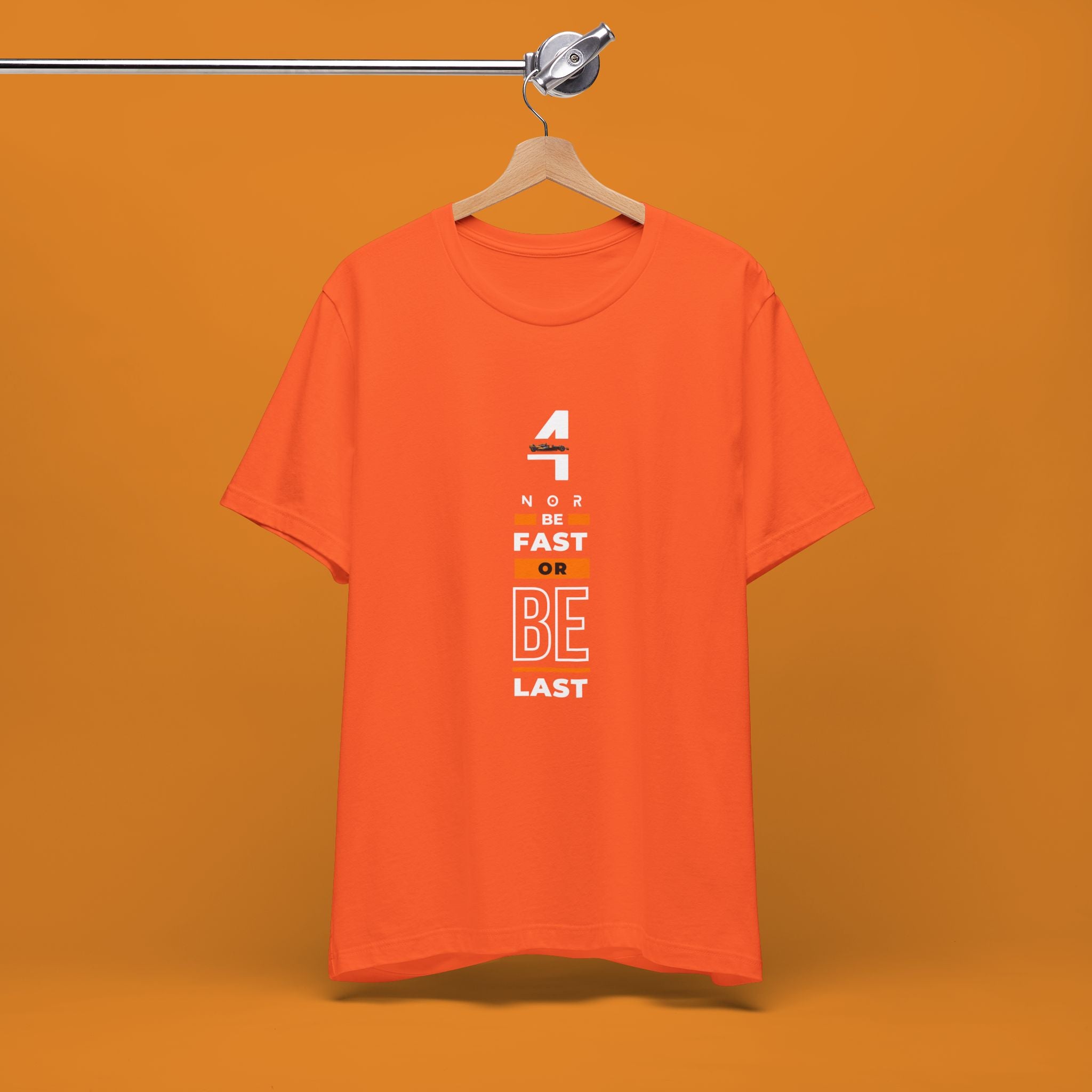 Papaya orange racing-inspired unisex short sleeve tee with a motorsport aesthetic. Perfect for Grand Prix fans and speed enthusiasts.