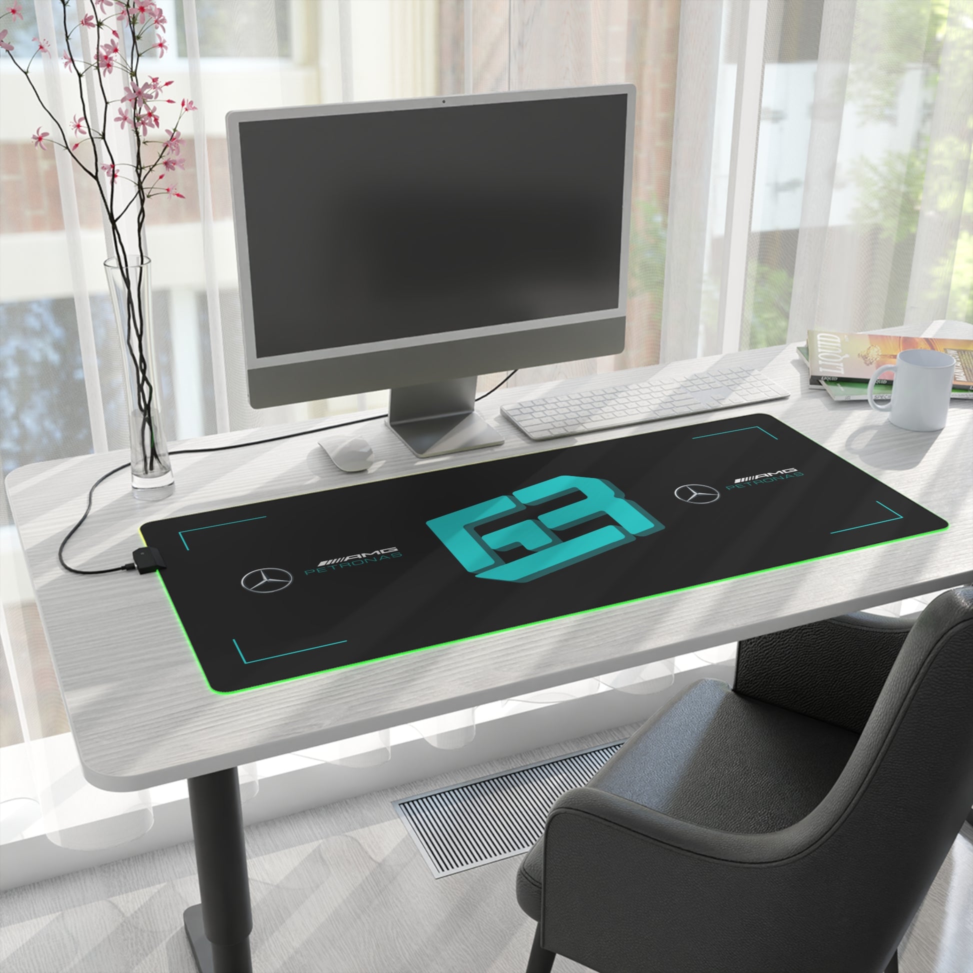 Silver and black racing-inspired gaming mouse pad with a high-precision surface and sleek motorsport aesthetic. Inspired by tire management and elite control.