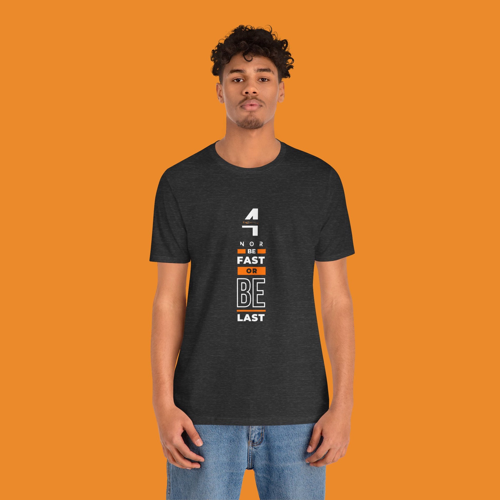 Papaya orange racing-inspired unisex short sleeve tee with a motorsport aesthetic. Perfect for Grand Prix fans and speed enthusiasts.