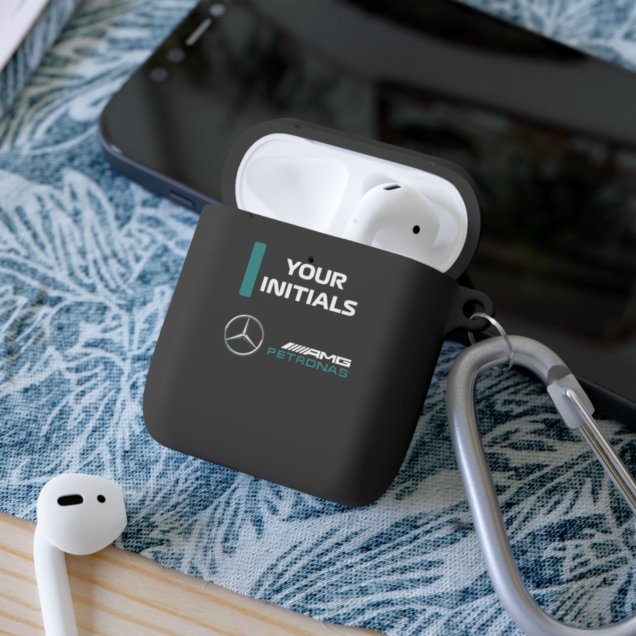 Silver Arrow racing-inspired AirPods case with shockproof protection, customizable initials, and a Grand Prix aesthetic. Perfect for motorsport enthusiasts and speed lovers.