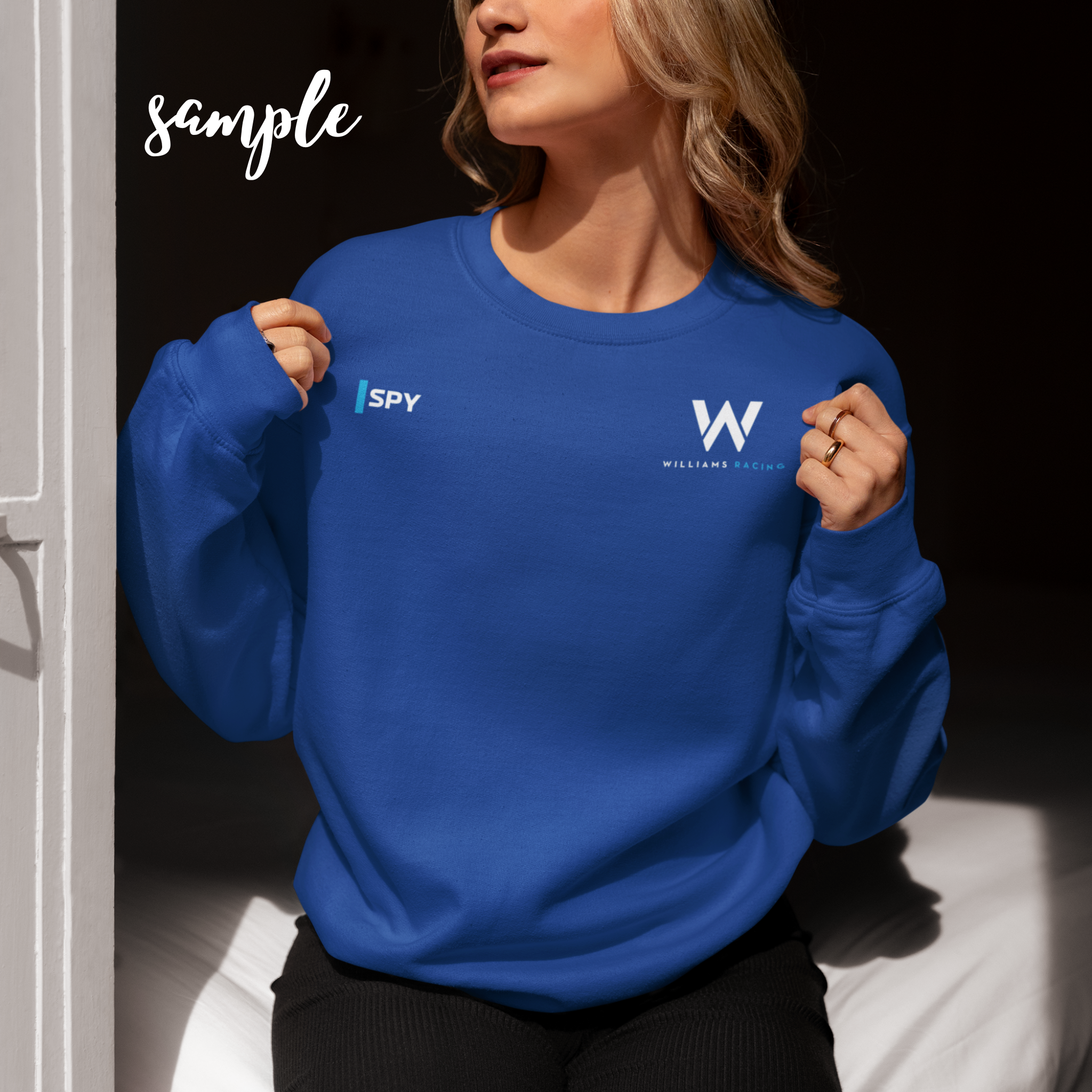 Azure blue racing-inspired crewneck sweatshirt with a motorsport aesthetic, custom initials, and heavyweight comfort. Perfect for Grand Prix fans and speed enthusiasts.