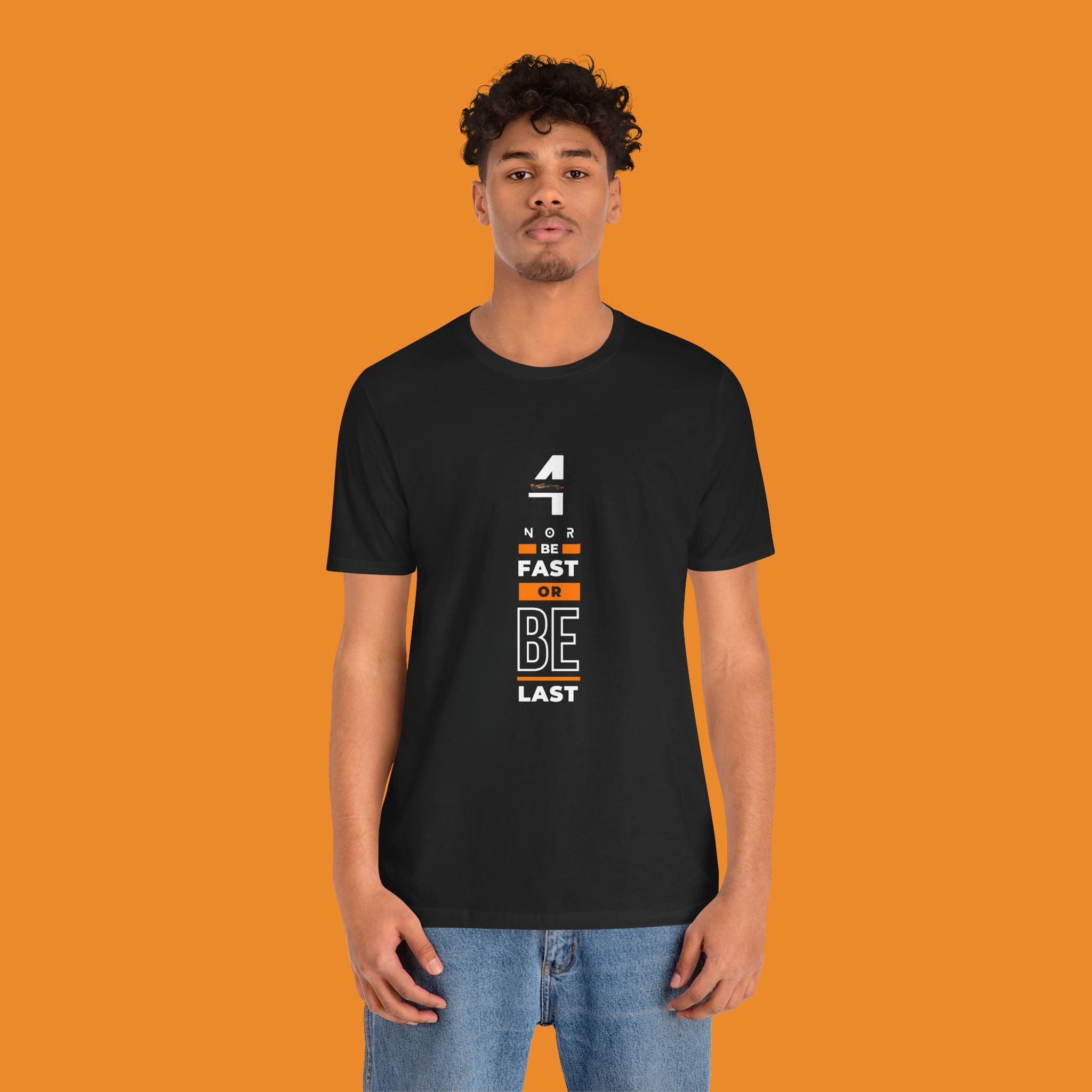 Papaya orange racing-inspired unisex short sleeve tee with a motorsport aesthetic. Perfect for Grand Prix fans and speed enthusiasts.