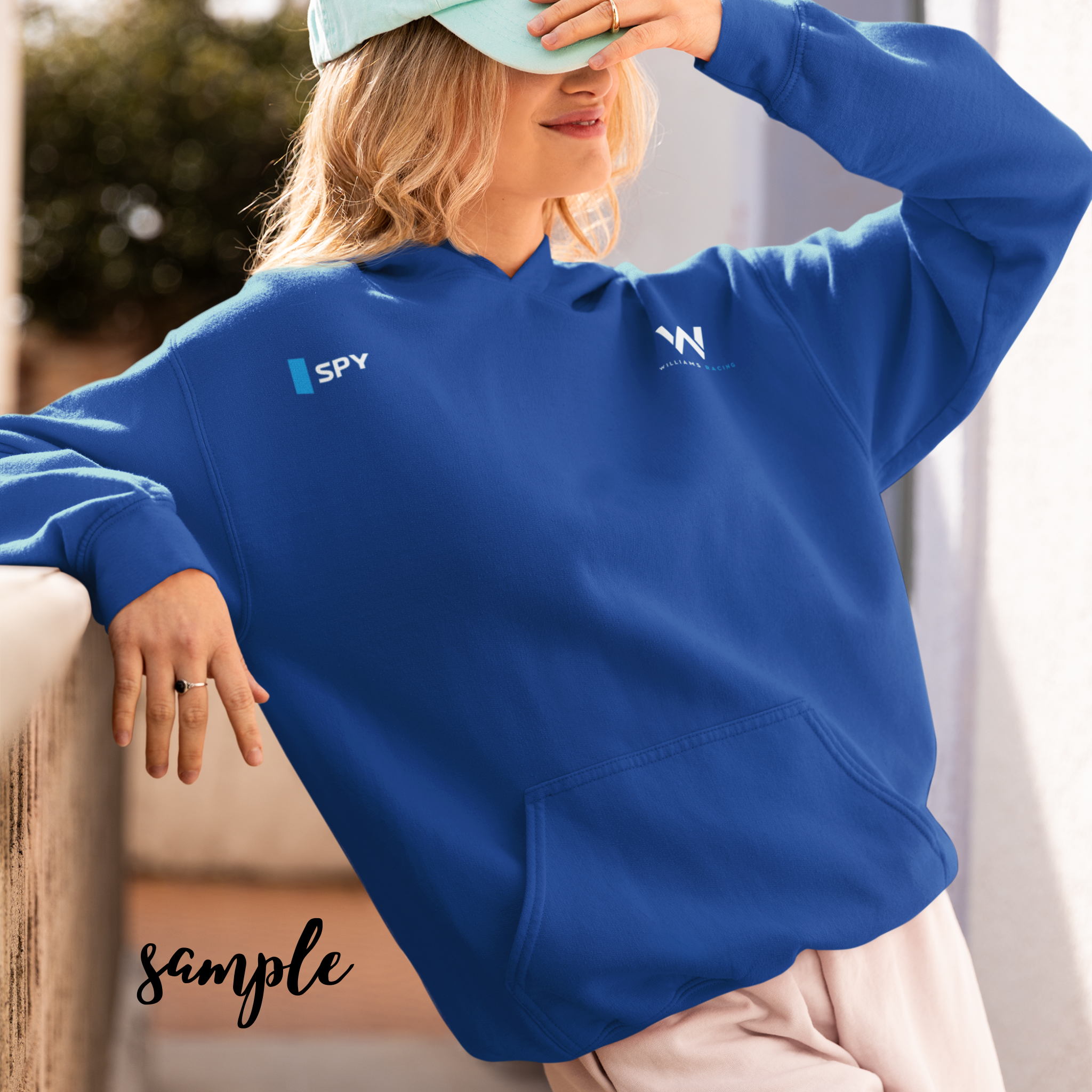 Azure blue racing-inspired hoodie with a motorsport aesthetic, custom initials, and heavyweight comfort. Perfect for Grand Prix fans and speed enthusiasts.