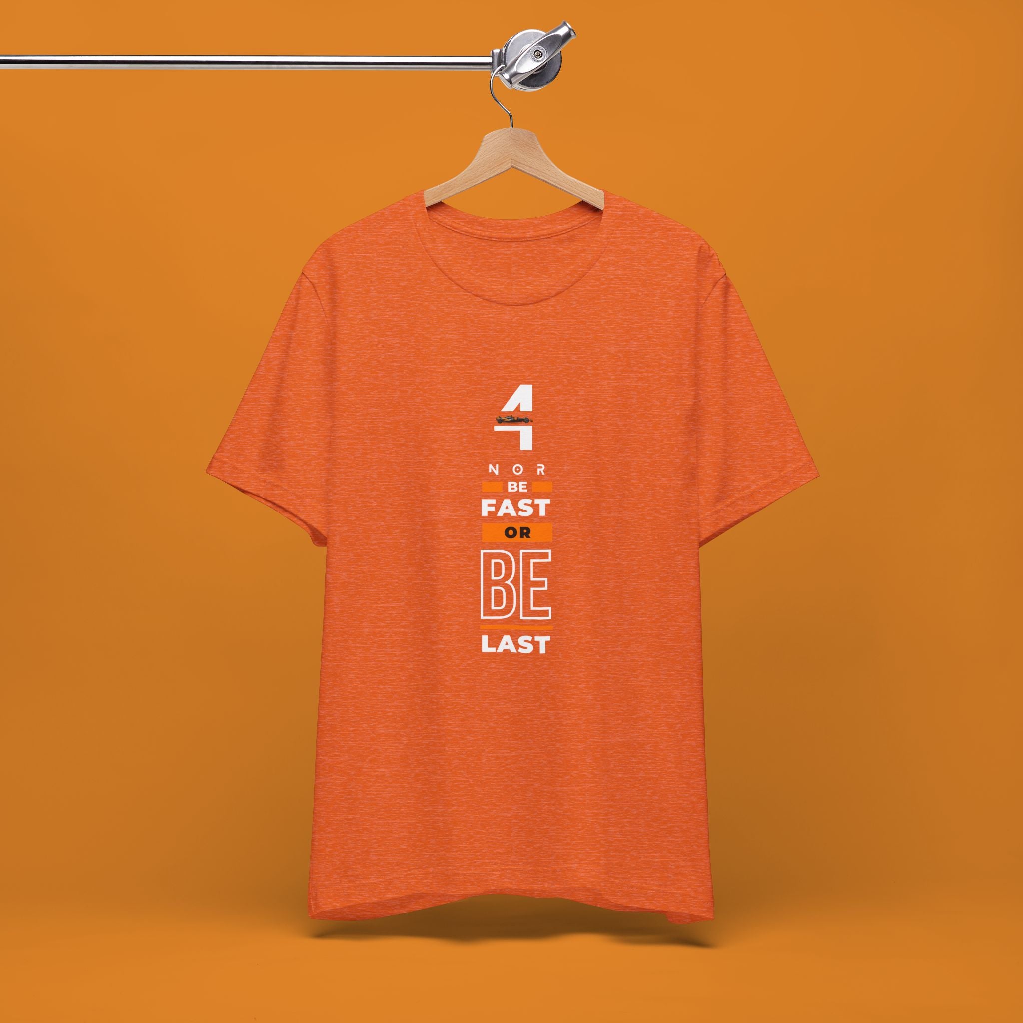 Papaya orange racing-inspired unisex short sleeve tee with a motorsport aesthetic. Perfect for Grand Prix fans and speed enthusiasts.