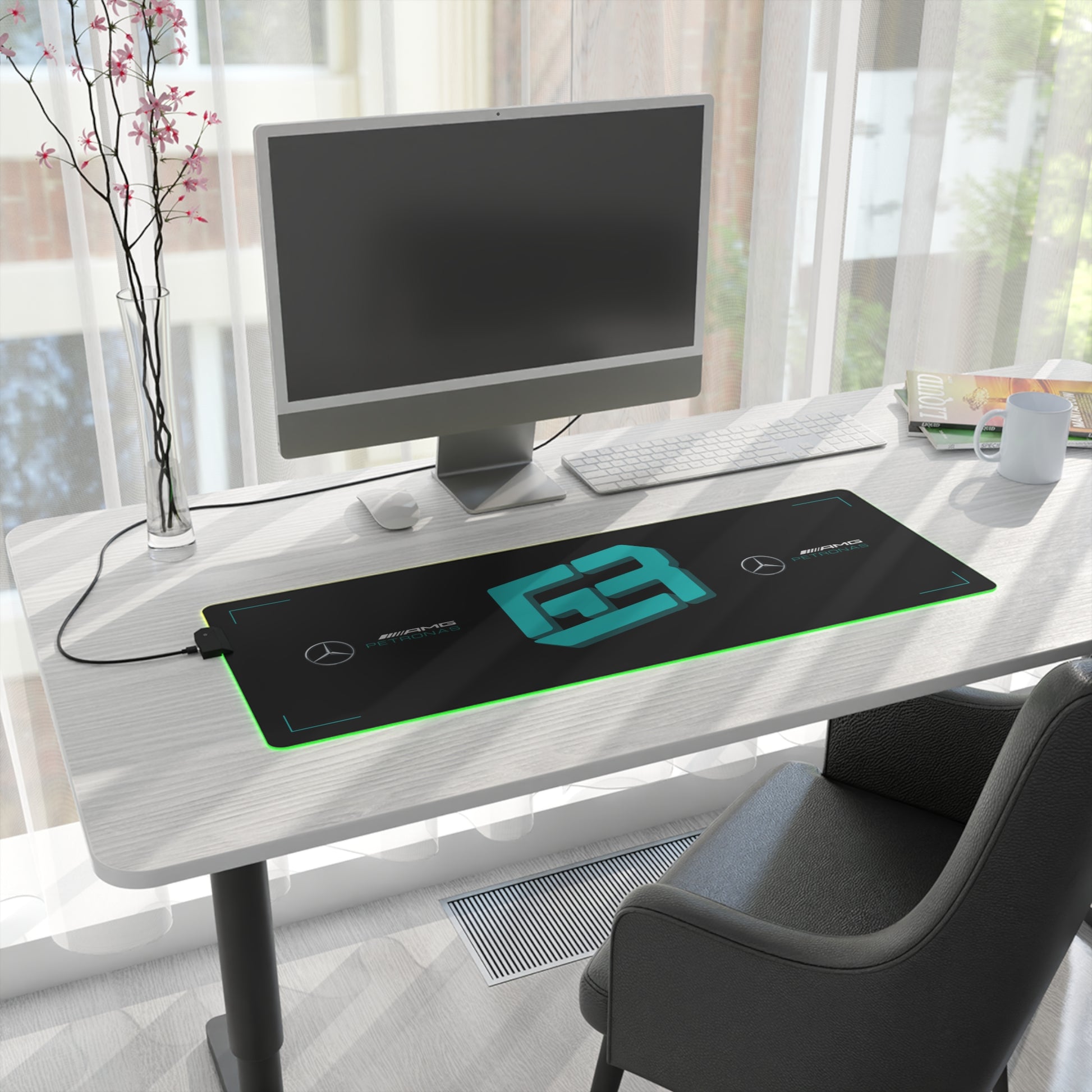 Silver and black racing-inspired gaming mouse pad with a high-precision surface and sleek motorsport aesthetic. Inspired by tire management and elite control.