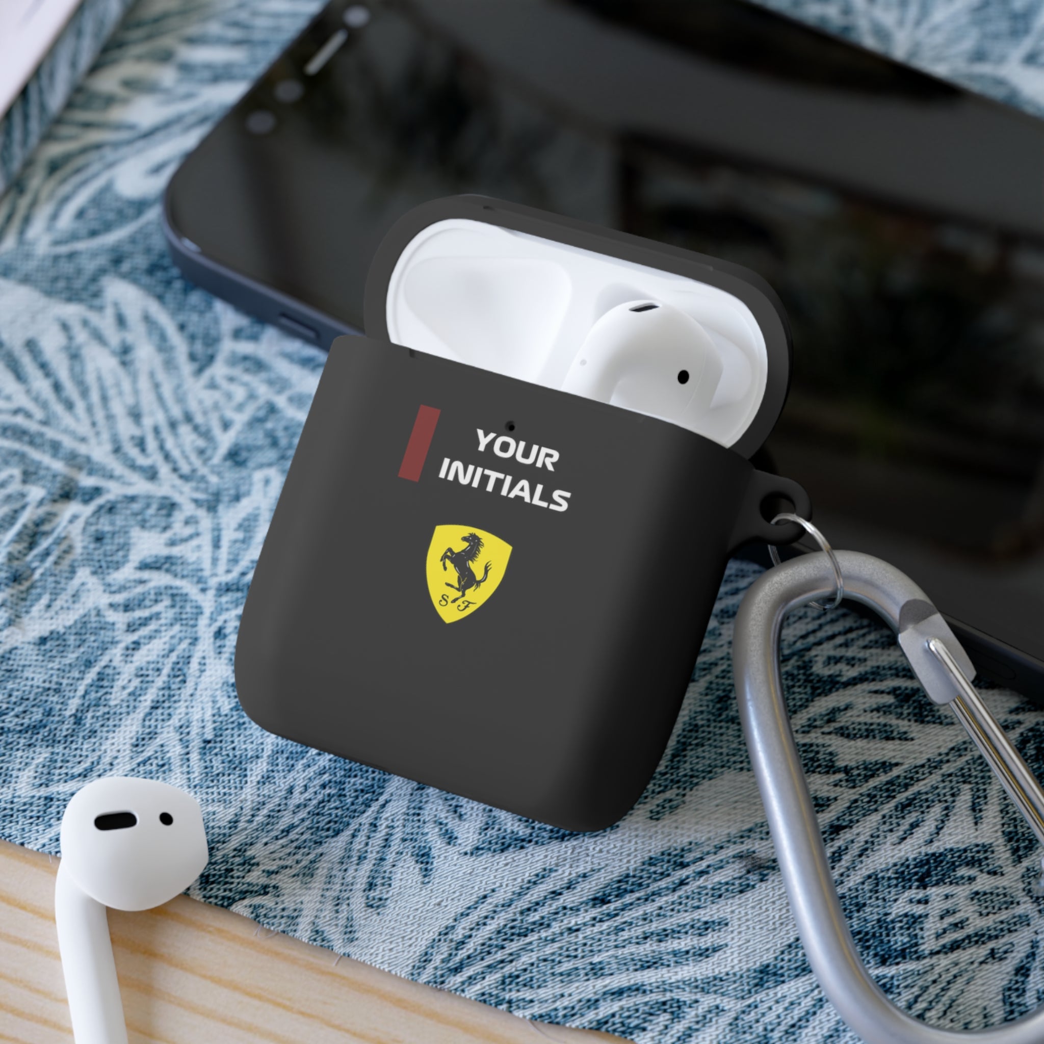 Bold red racing-inspired AirPods case with custom initials, inspired by Grand Prix heritage and Italian motorsport legends. Perfect for racing enthusiasts and supercar fans.