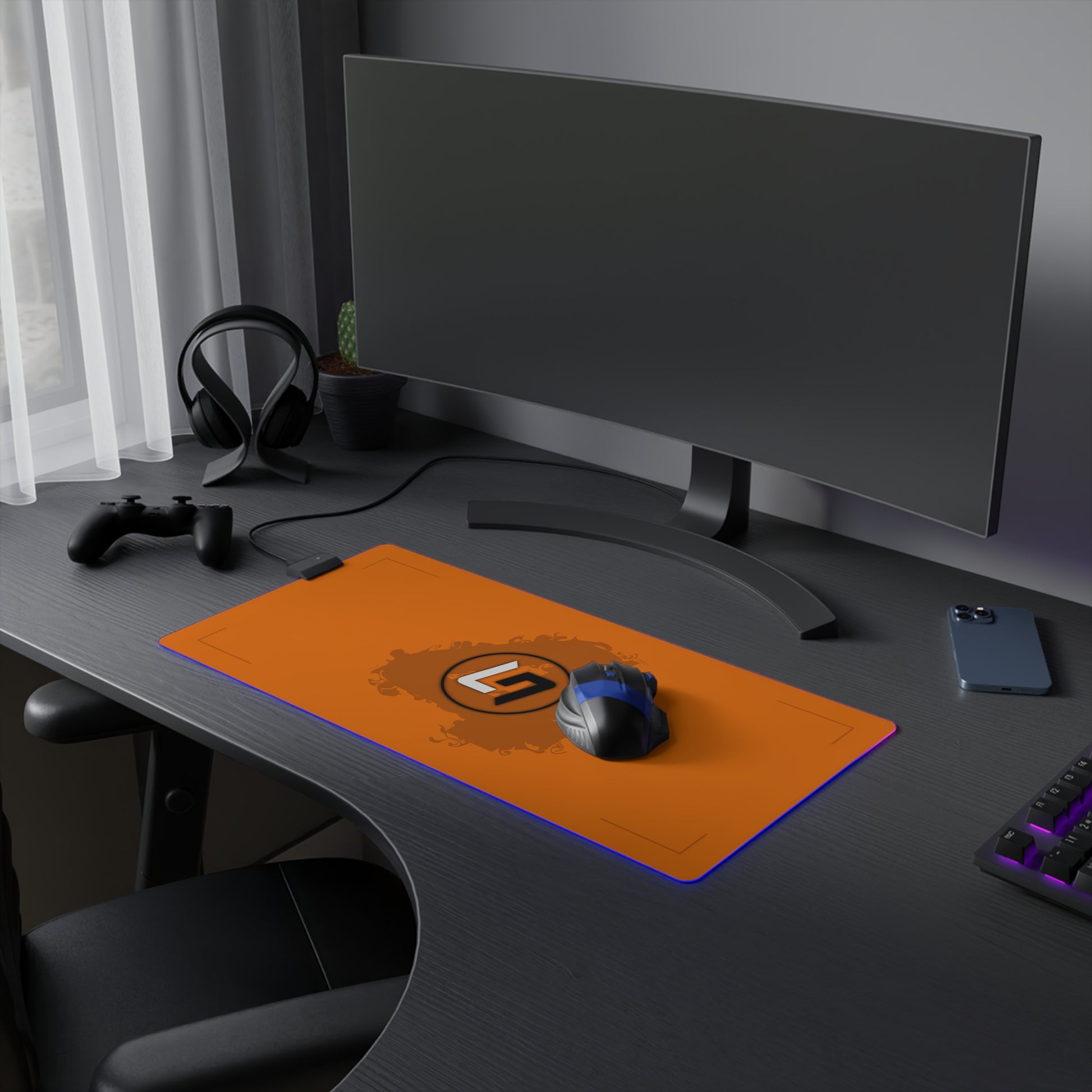 Papaya orange and black racing-inspired mouse pad with a high-performance glide surface. Inspired by young British racing talent.