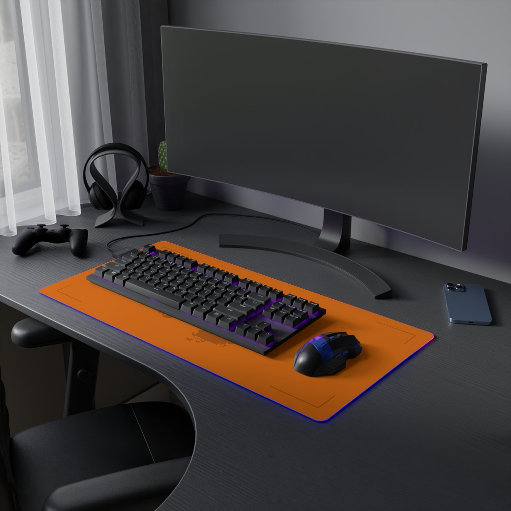 Papaya orange and black racing-inspired mouse pad with a high-performance glide surface. Inspired by young British racing talent.