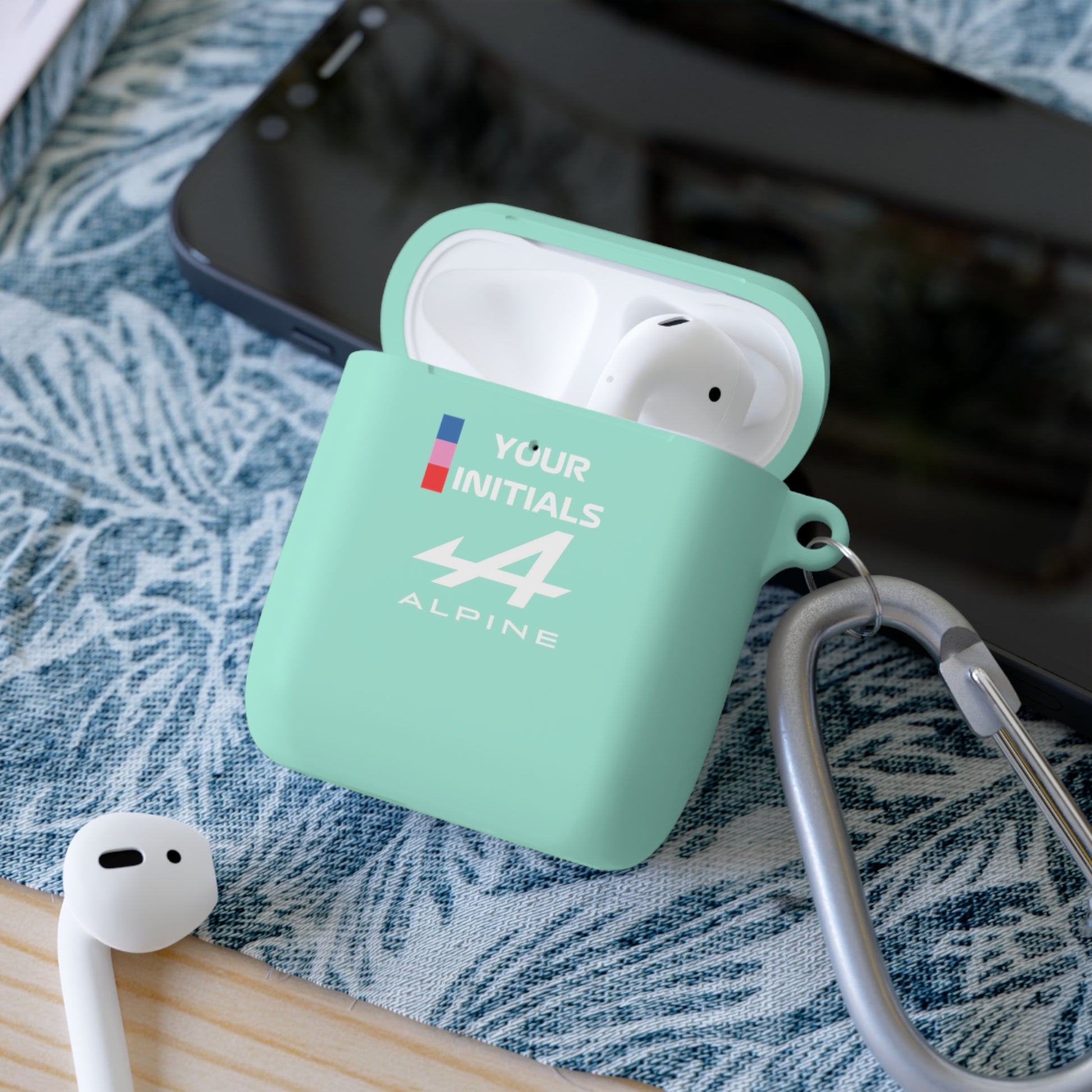 Blue and pink racing-inspired AirPods case with a sleek Grand Prix aesthetic and custom initials option. Ideal for motorsport fans.