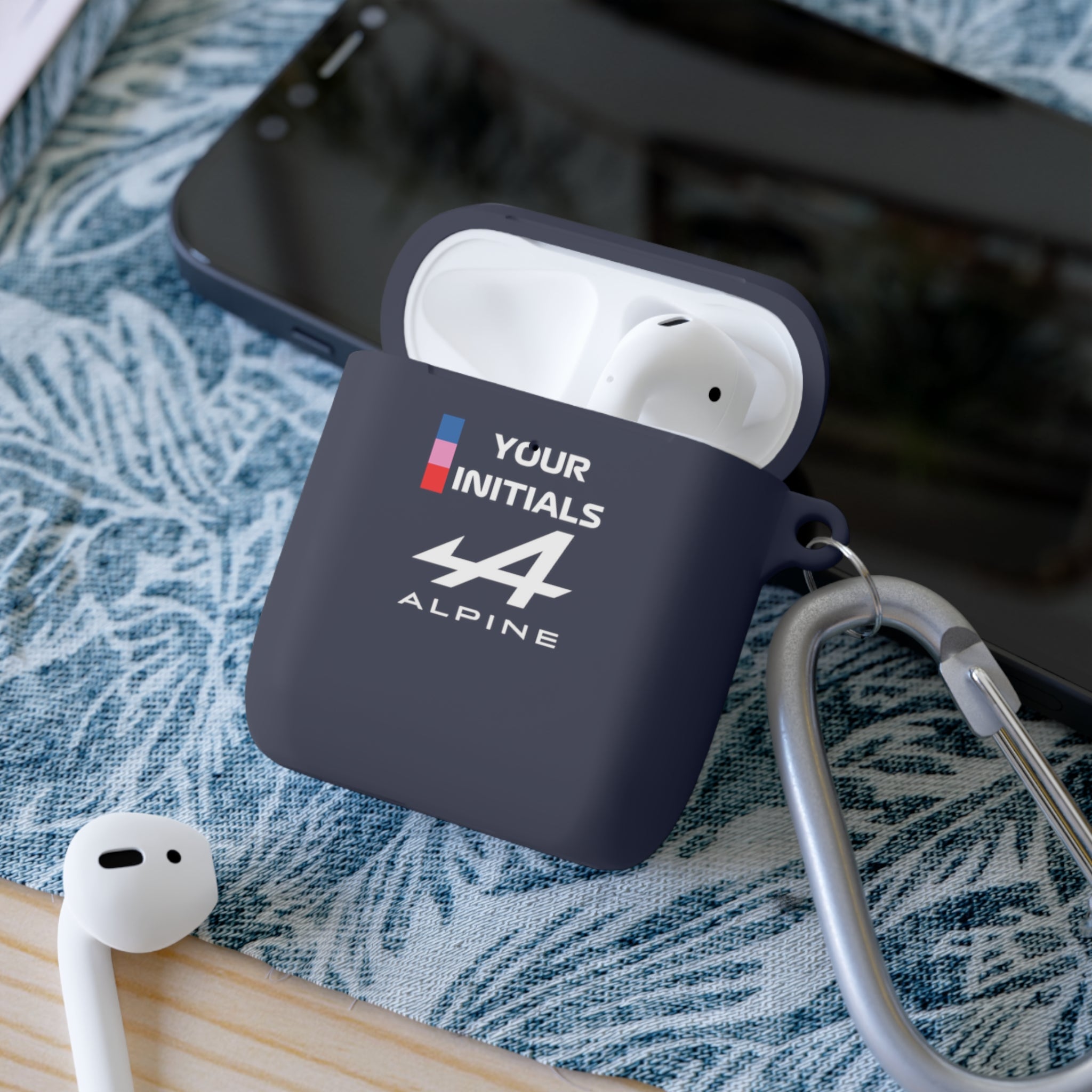 Blue and pink racing-inspired AirPods case with a sleek Grand Prix aesthetic and custom initials option. Ideal for motorsport fans.